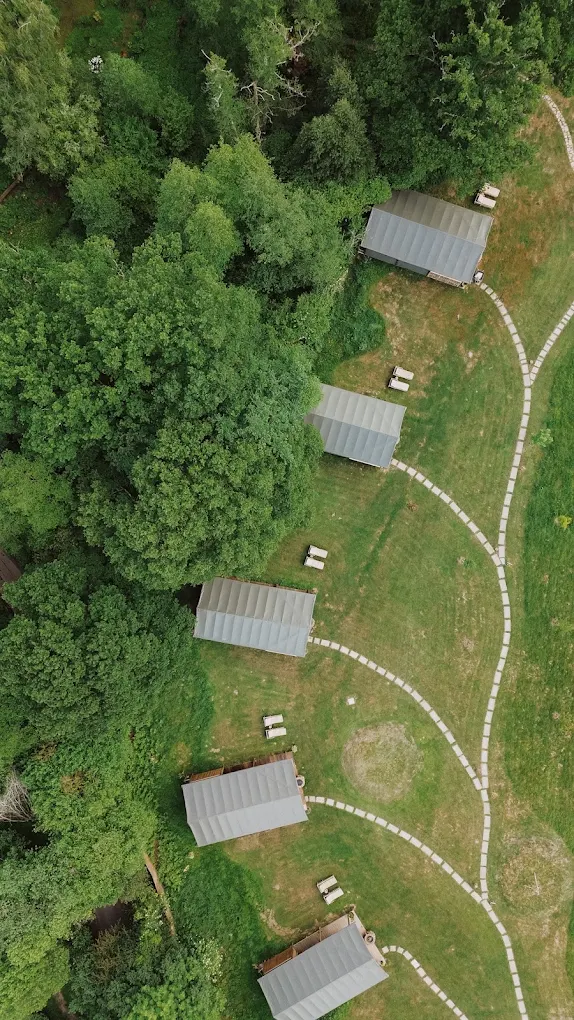 Aerial view of the Firesyde safari lodges set across the Surrey countryside